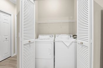 Full-sized washer/dryers in each home